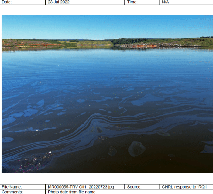 Figure 7. Image taken of the tailing pond where the incident occurred with visible bitumen floating in the industrial water.